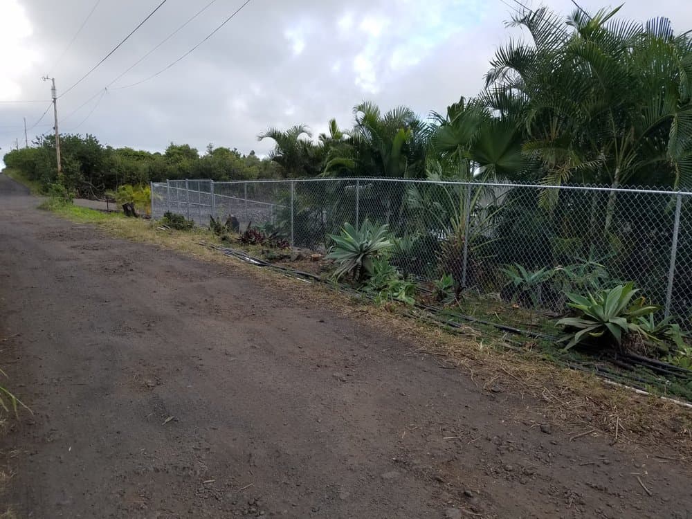 100 feet and gates 500 feet total Chain Link Fence — On The Line Fencing project, Big Island, Hawaii