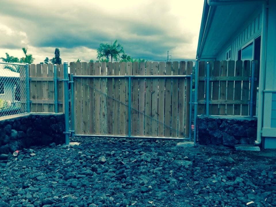 Wood picket fence with gate — On The Line Fencing project, Big Island, Hawaii